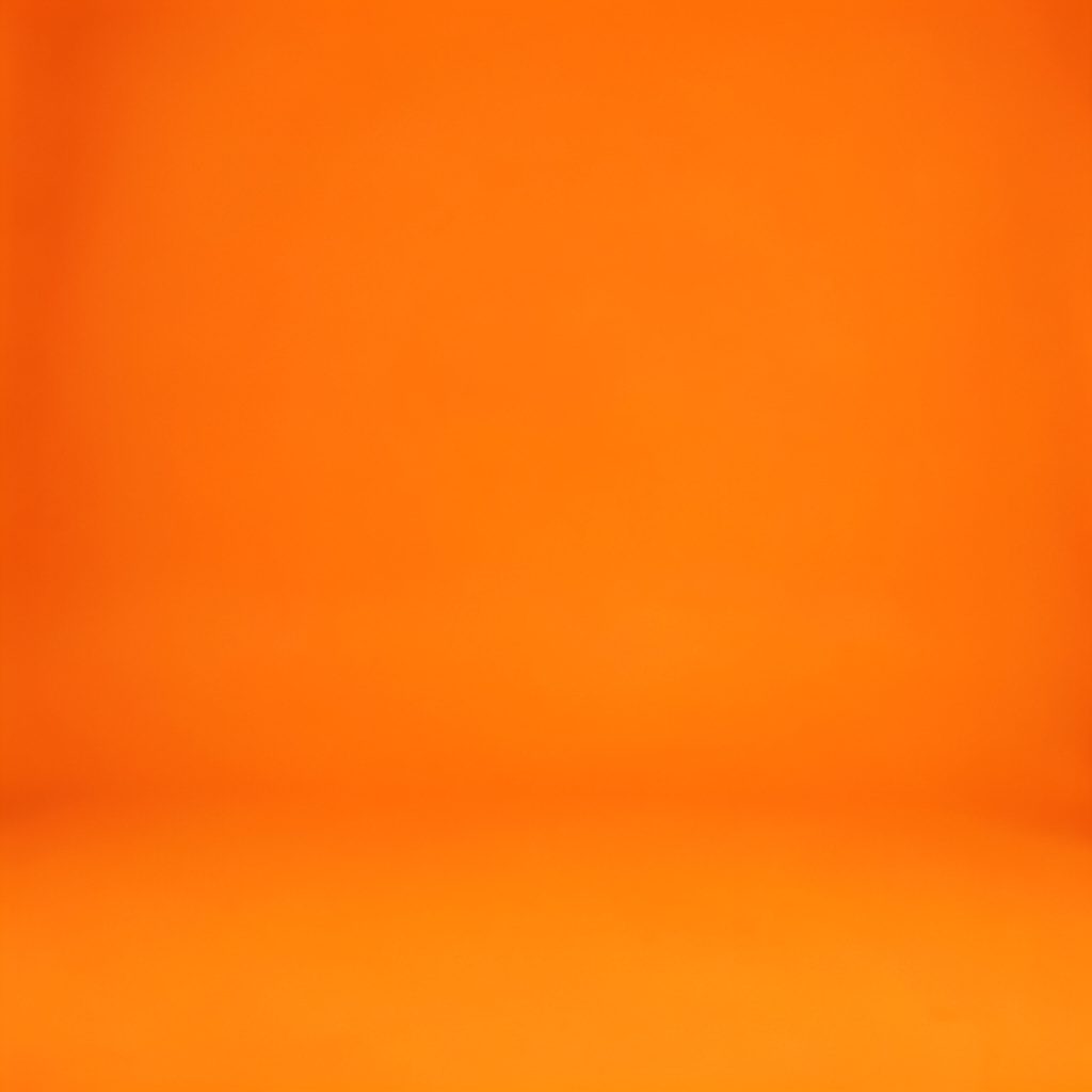 Dynamic group shot of a jazz ensemble in performance, warm amber stage glow with deep navy shadows